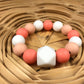 Silicone Pacifier Clip & Teething Bracelet - Orange Creamsicle